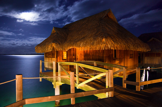 The famous over-water cabanas of Bora Bora Lagoon.